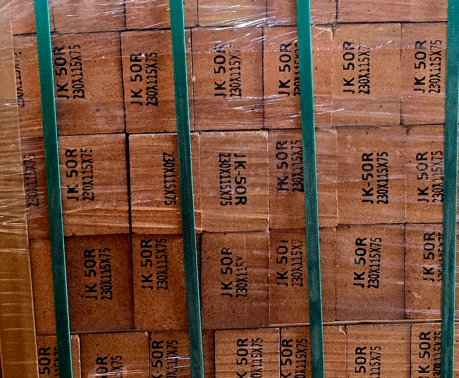 Refractory brick with grade stenciling